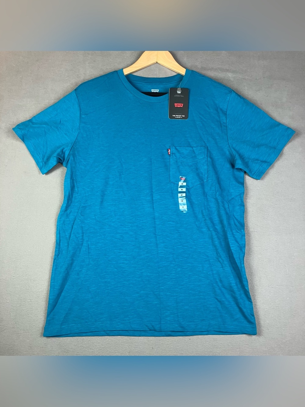 Levis Men’s Size M Short Sleeve Solid Teal Blue Pocket T Shirt NWT!